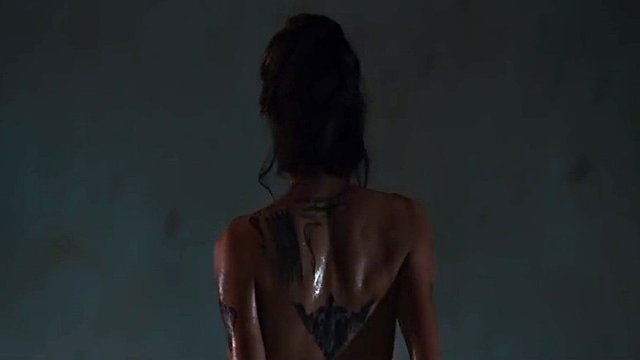 Angelina Jolie shows off her smooth bare ass