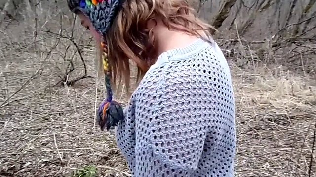 Sweater girl strips in the forest and shows her tits