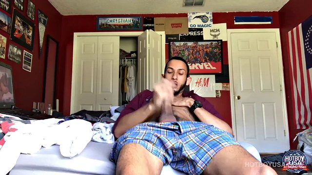 Handsome young Brian Bonerz is in his bedroom watching porn on the bed, as he begins to stiffen. Suddenly, a big dick comes out of his boxer fly, and he begins to stroke, while throwing time in time a look at the porn played on his laptop.