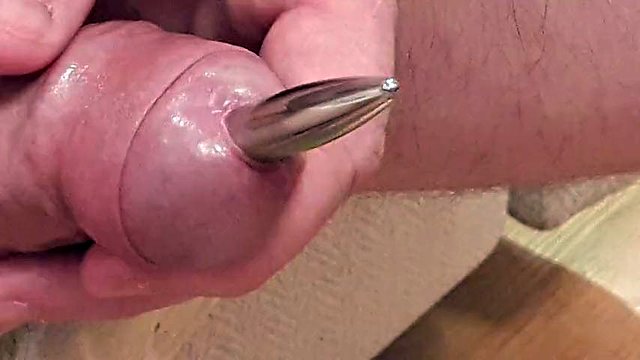 Extreme deep  cock sounding  close up and a cumshot while sounding  rod is fully  inside