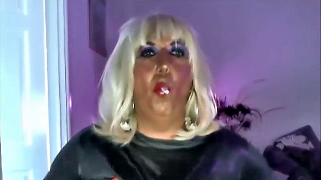 Chrissie smoking and masturbate in black PVC on the Web