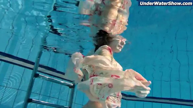 Slow motion teenage girl in Czech swimming