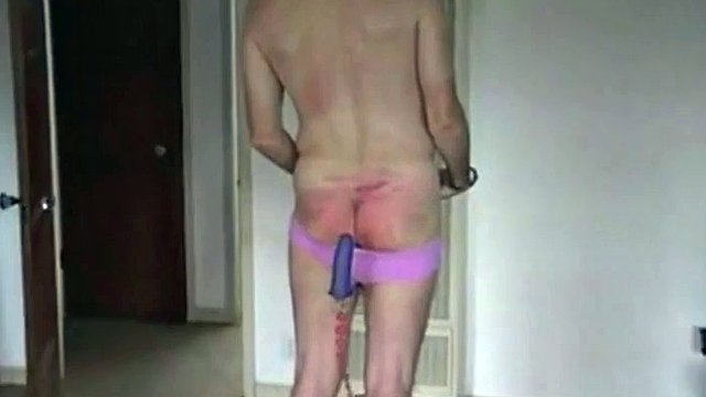 black domme spanks spanking and paddling pantyhose ass wearing white male slave to make it suck cock