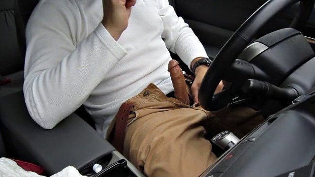 Rainy day jerk-off in my car in a parking lot, verbal, stroking my cock and cumming. Wearing khakis and nice orgasm