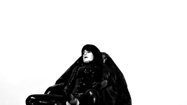 Latex crossdresser alone