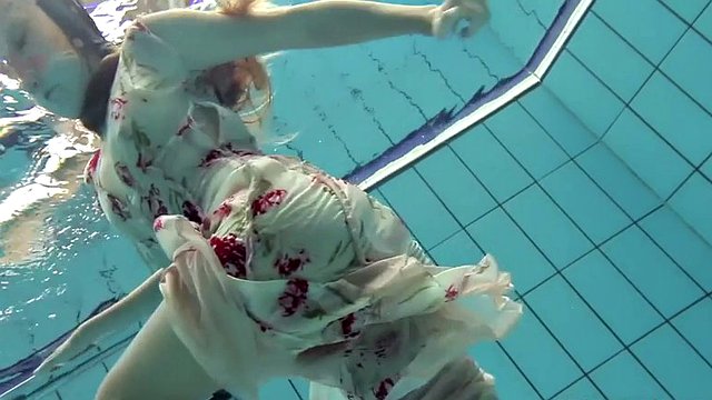 lucy takes the dress off showing her hairy pussy and titties underwater