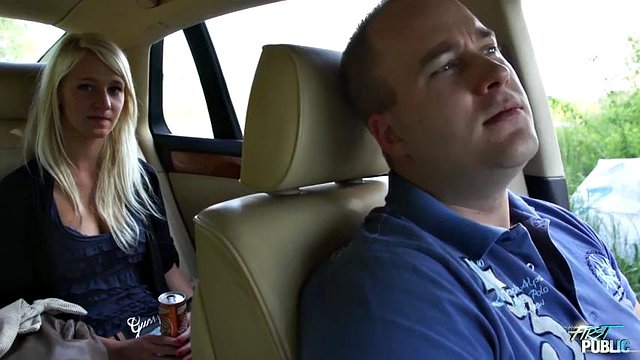 Girl leans out car window to suck cock