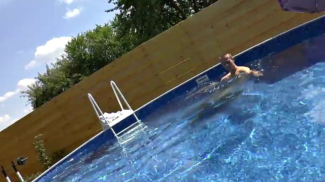 Fine gay boy gets a handjob in a pool