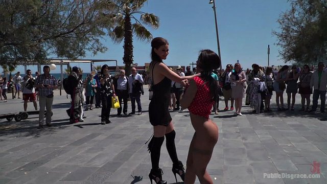 Tied up babe with big tits takes a walk in the town