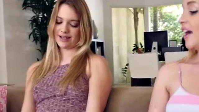 Amazing two blonde beauties show off their lingerie and please each other with a huge red dildo