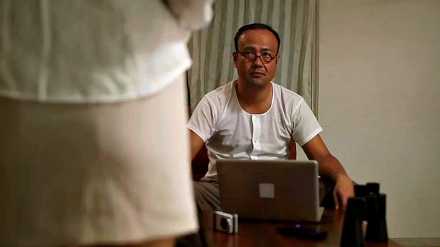 Asian milf sucks his cock and receives a big facial