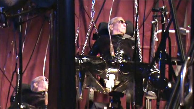 Latex Geared Suspended and Machine Fucked and Milked
