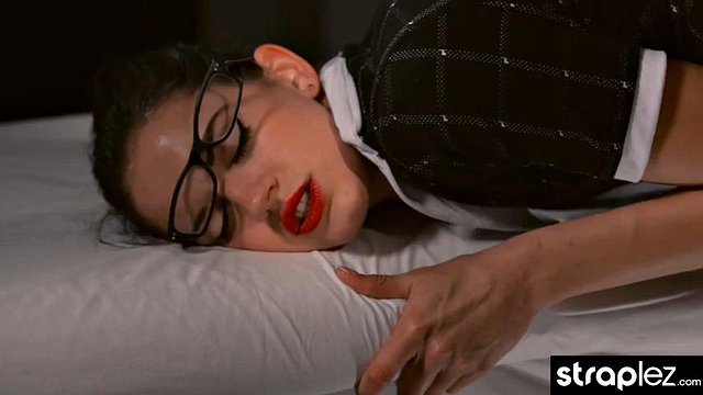Jerking her girlfriend s strapon until it sprays her with cum
