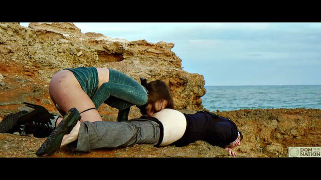 Licking submissive feet and eating ass by the sea