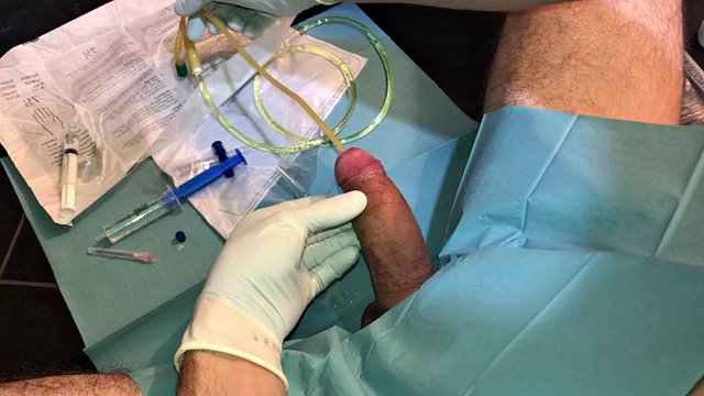 The first painful insertion of a catheter with cumshot into the urethra