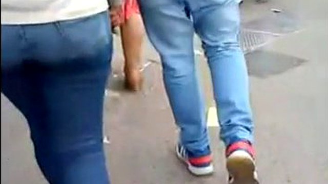 Big ass babe and calves in public in a loose skirt