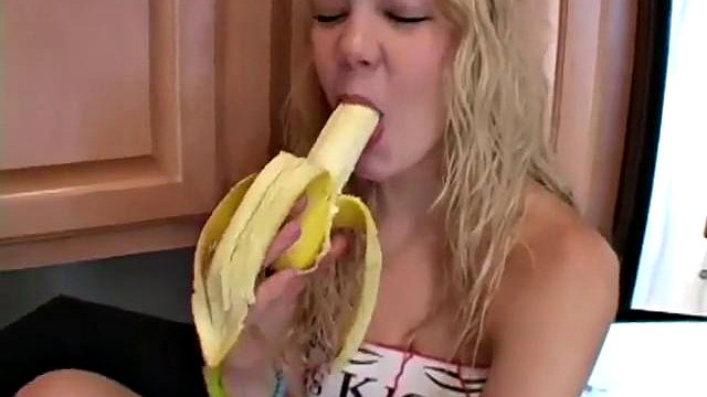 Naughty solo teen slut chewing on a banana