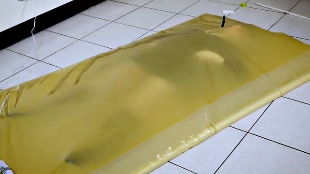 kigurumi vibrating in vacuum bed