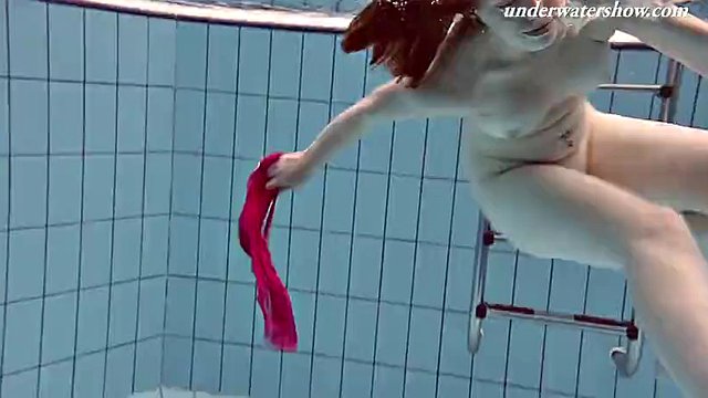 Lenka enjoys nude erotic sexy swimming