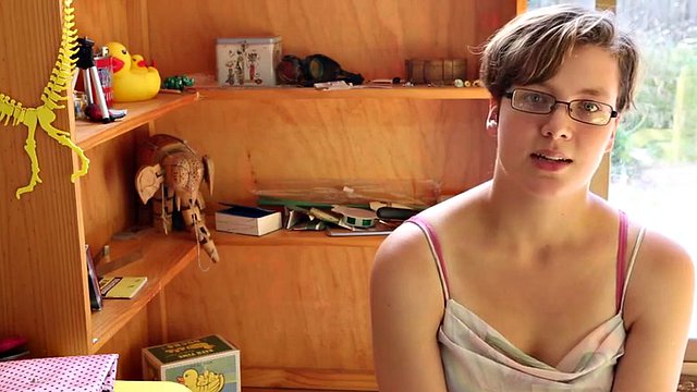 shy immie undresses and rubs her hairy bush