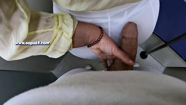 Horny MILF Strokes Stranger's Big Cock in Subway Handjob